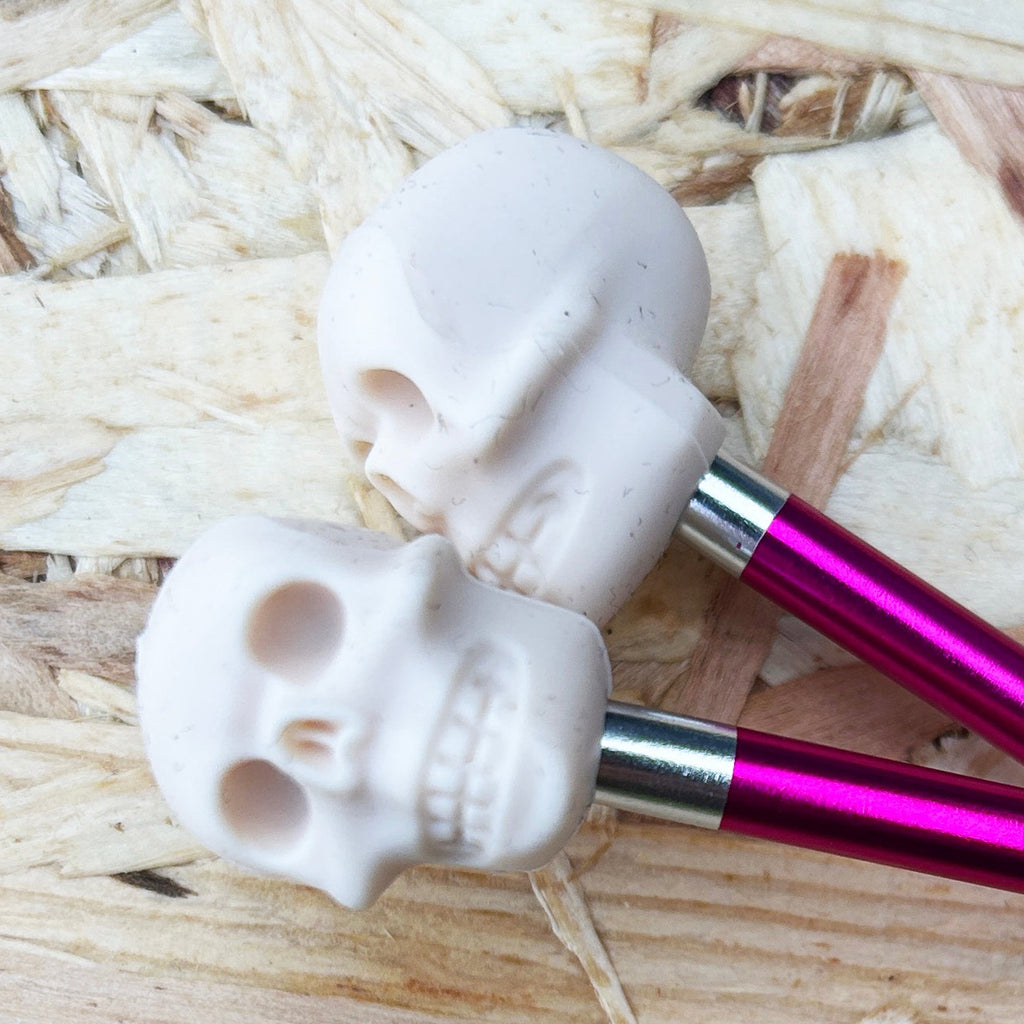 Cream Skull needle point protectors. Set of 2.