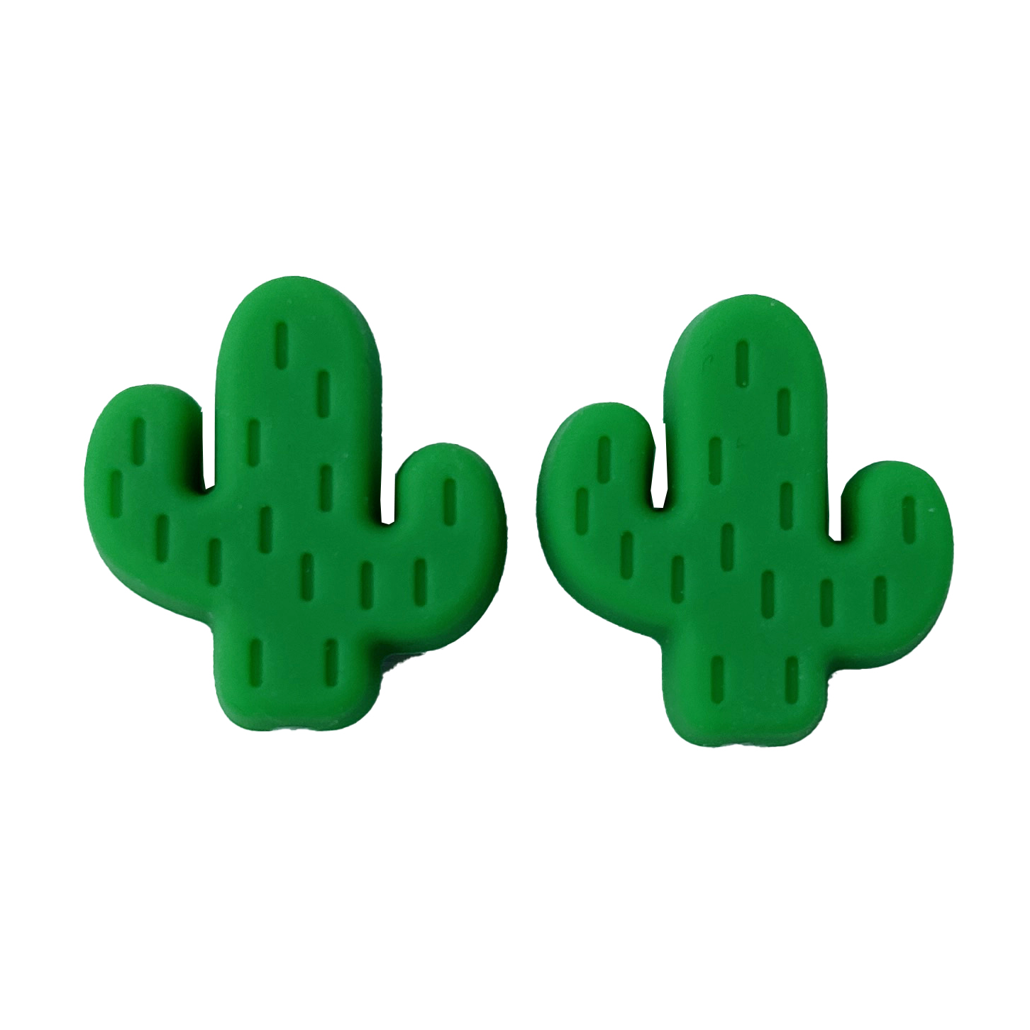 Green cactus-shaped needle point protectors on a white background