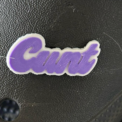 Cunt swear word croc charm. 