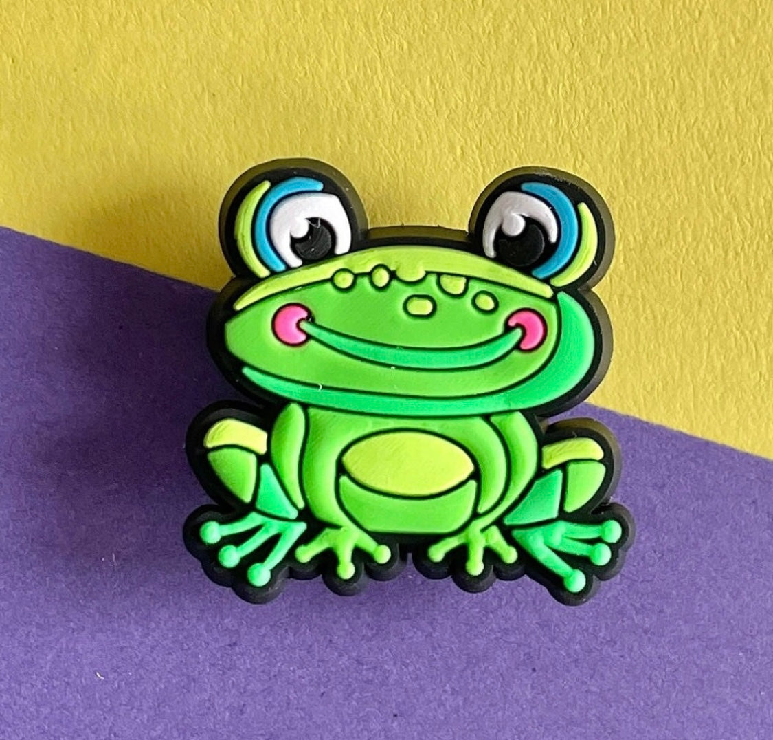 Frog shoe charm.