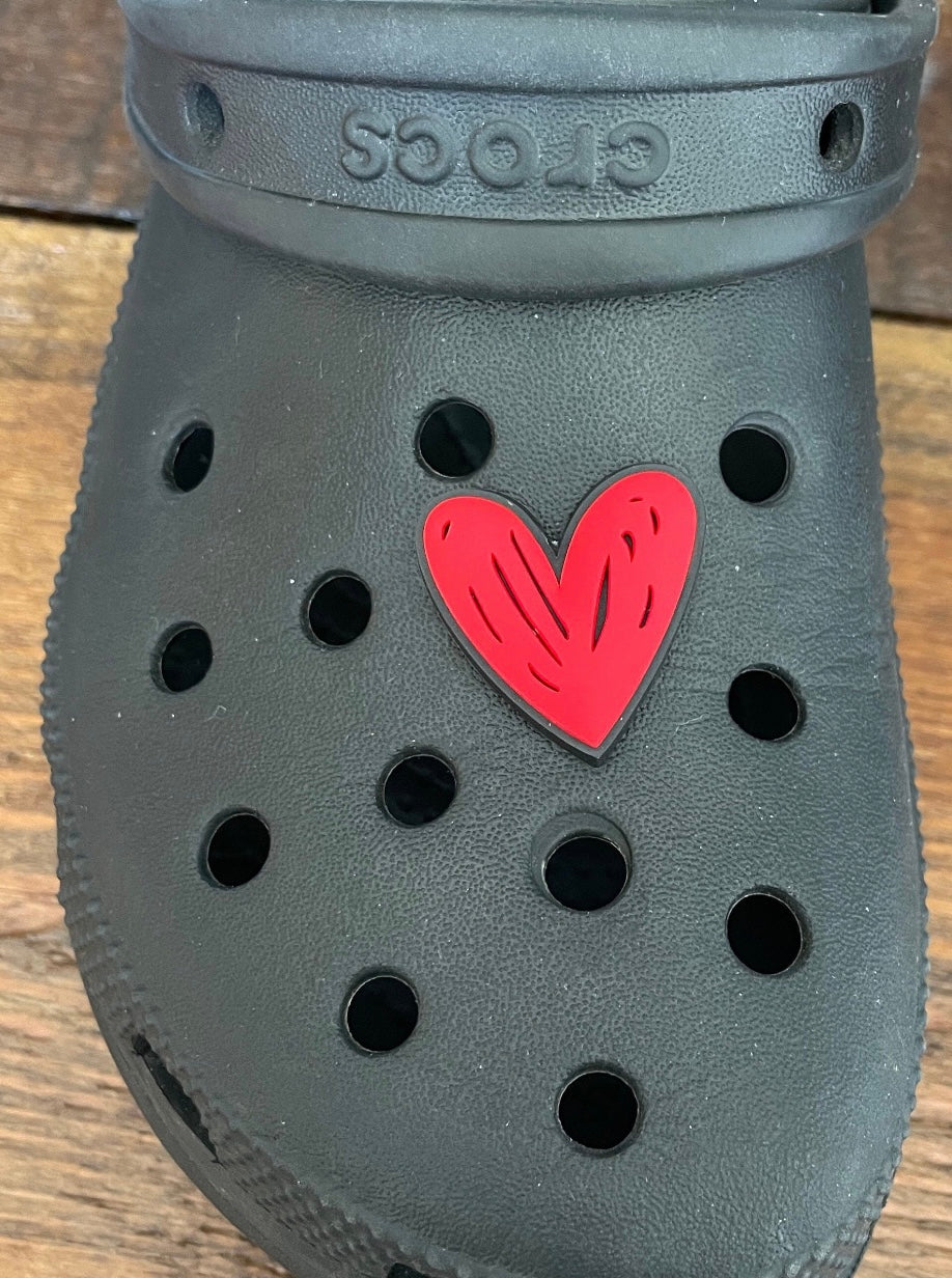 Doodle heart shoe charm on a croc shoe.