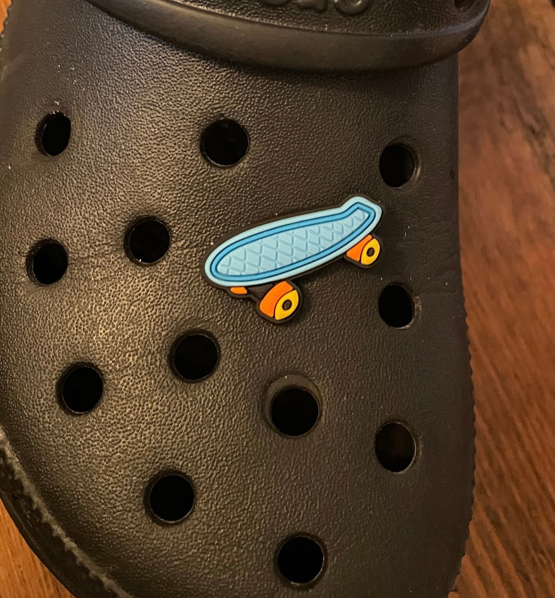 Skateboard Shoe Charm on a croc shoe. 