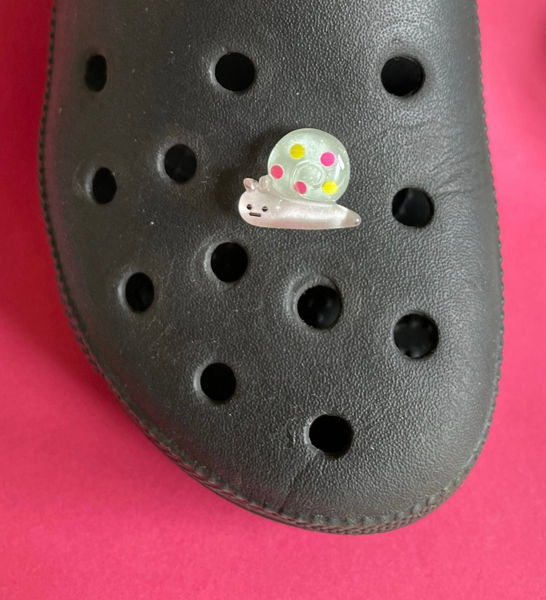 Snail 3D Resin shoe charm on a croc shoe.