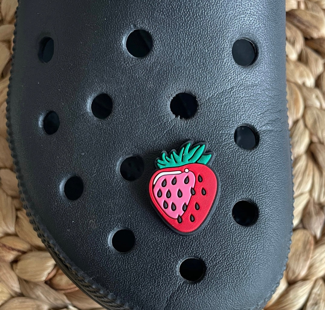 Strawberry Shoe Charm on a croc shoe.