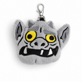 A gray plush monster keychain or bag purse charm with yellow eyes, black stitched details, and a silver metal clasp, shown on a plain white background.