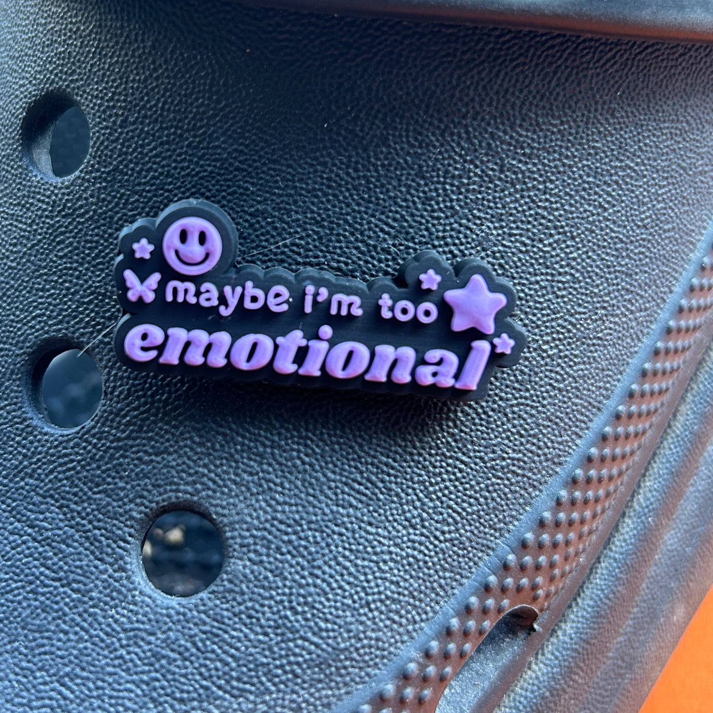 Maybe I'm Too Emotional Slogan croc like shoe charm. Shown on a black croc shoe. 