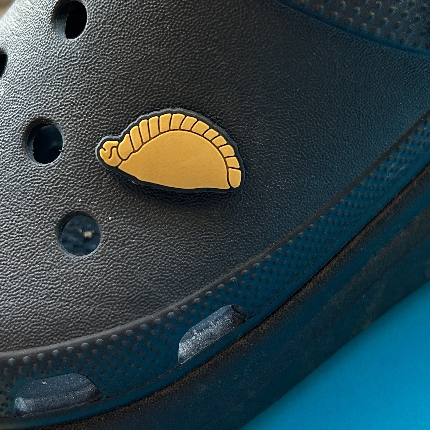 Cornish Pasty food croc like shoe charm. Shown on a black shoe. 