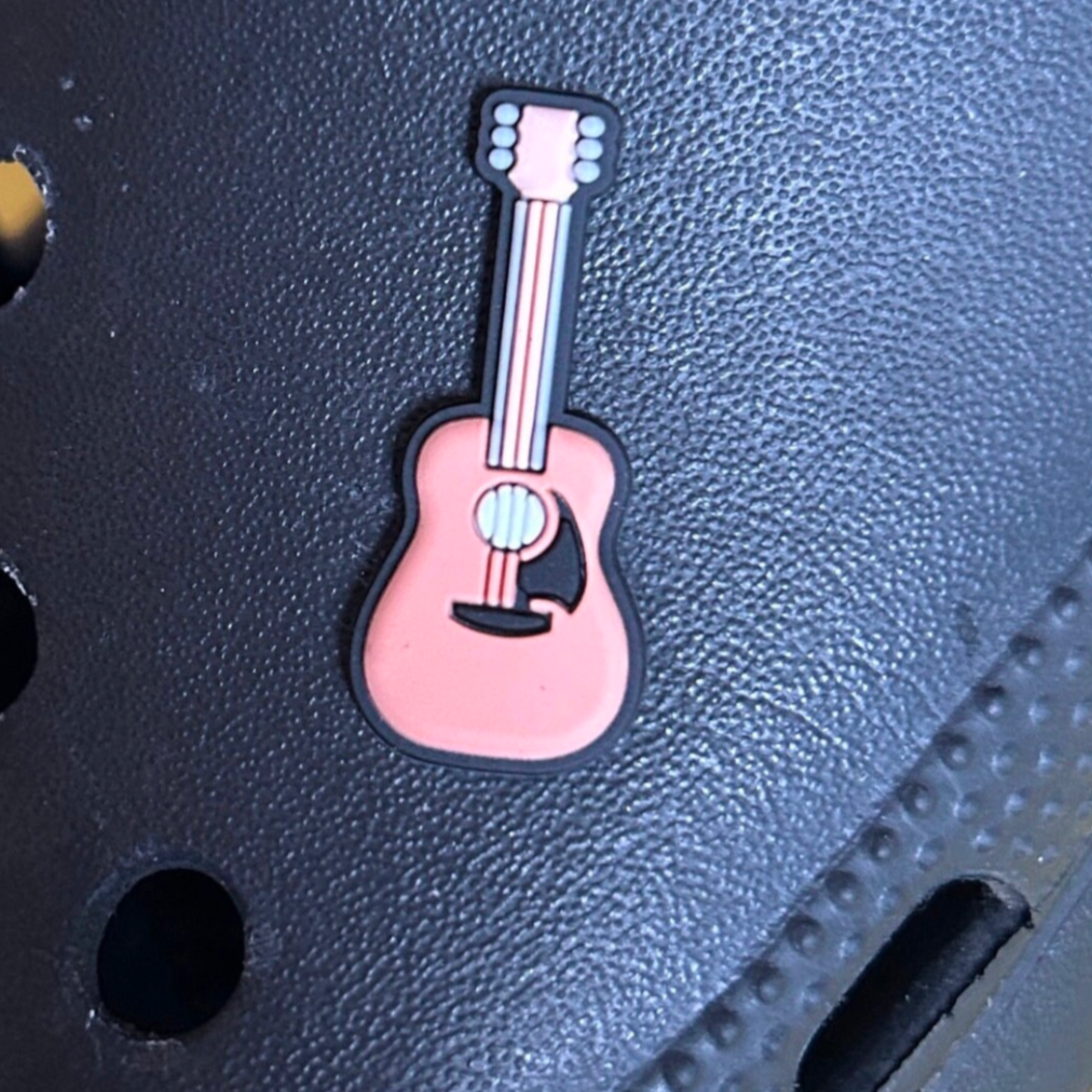 Acoustic Guitar croc like shoe charm. Shown on a black croc shoe. 