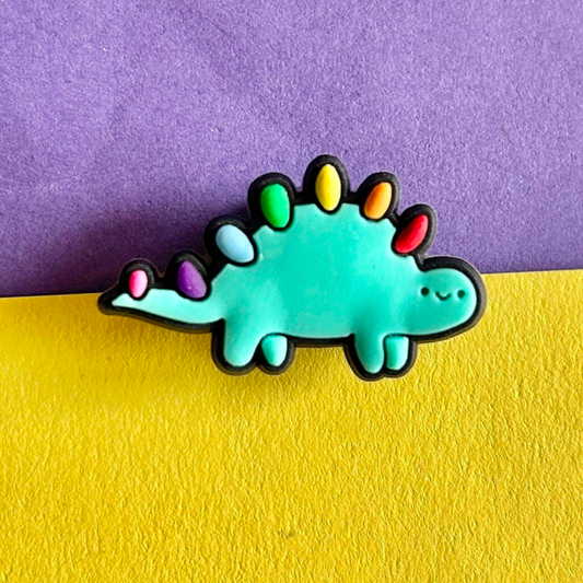 Cute multicoloured dinosaur croc like shoe charm.