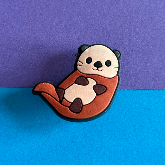 Cute Otter croc like shoe charm.