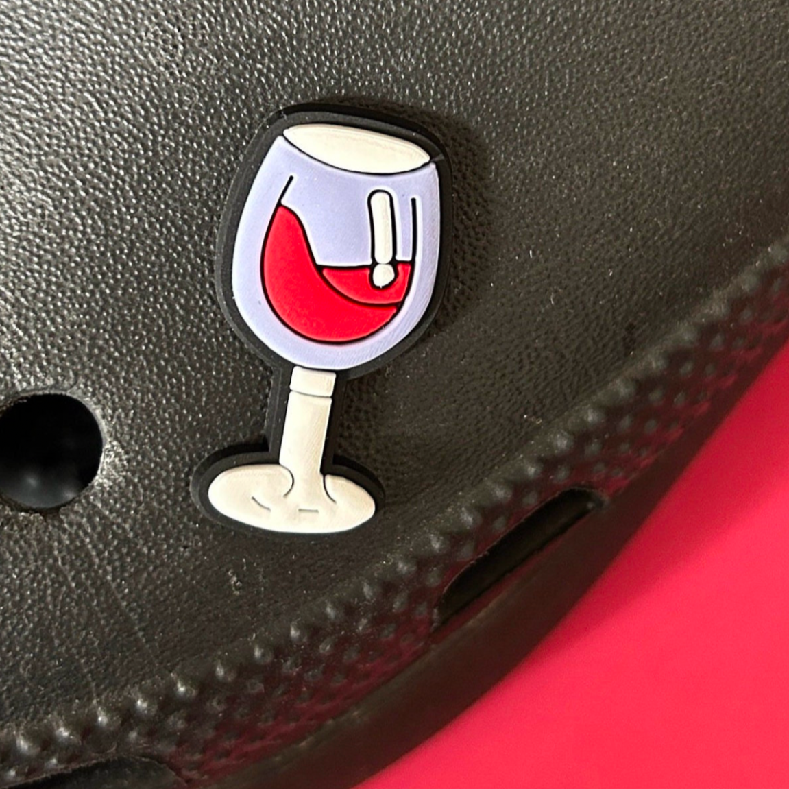 Glass of Red Wine croc like shoe charm. Shown on a black croc shoe. 