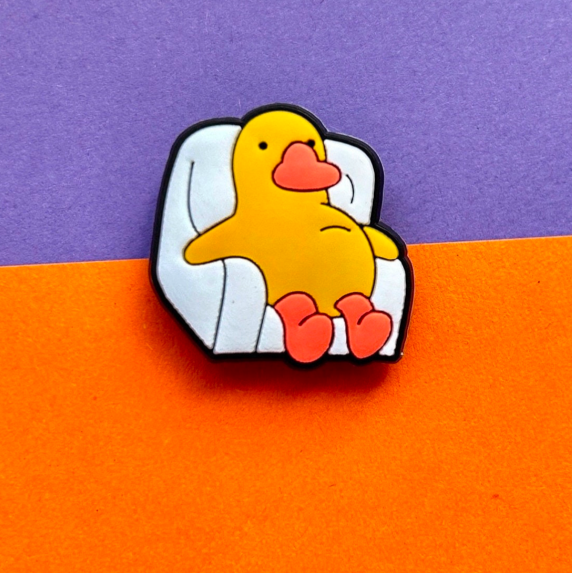 Yellow lazy Chick in a white Chair croc like shoe charm.