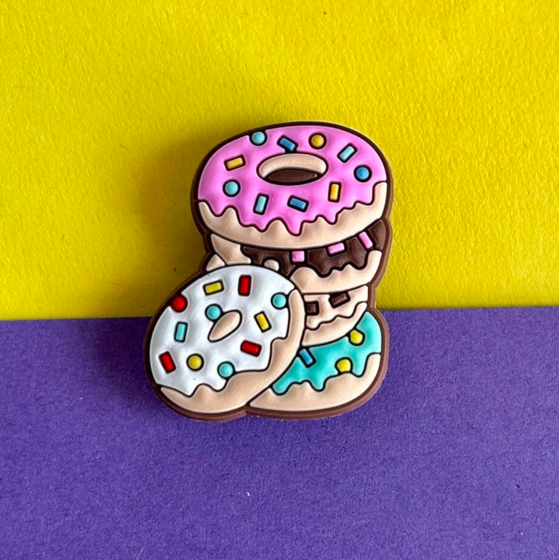 Multicoloured pile of Doughnuts croc like shoe charm.