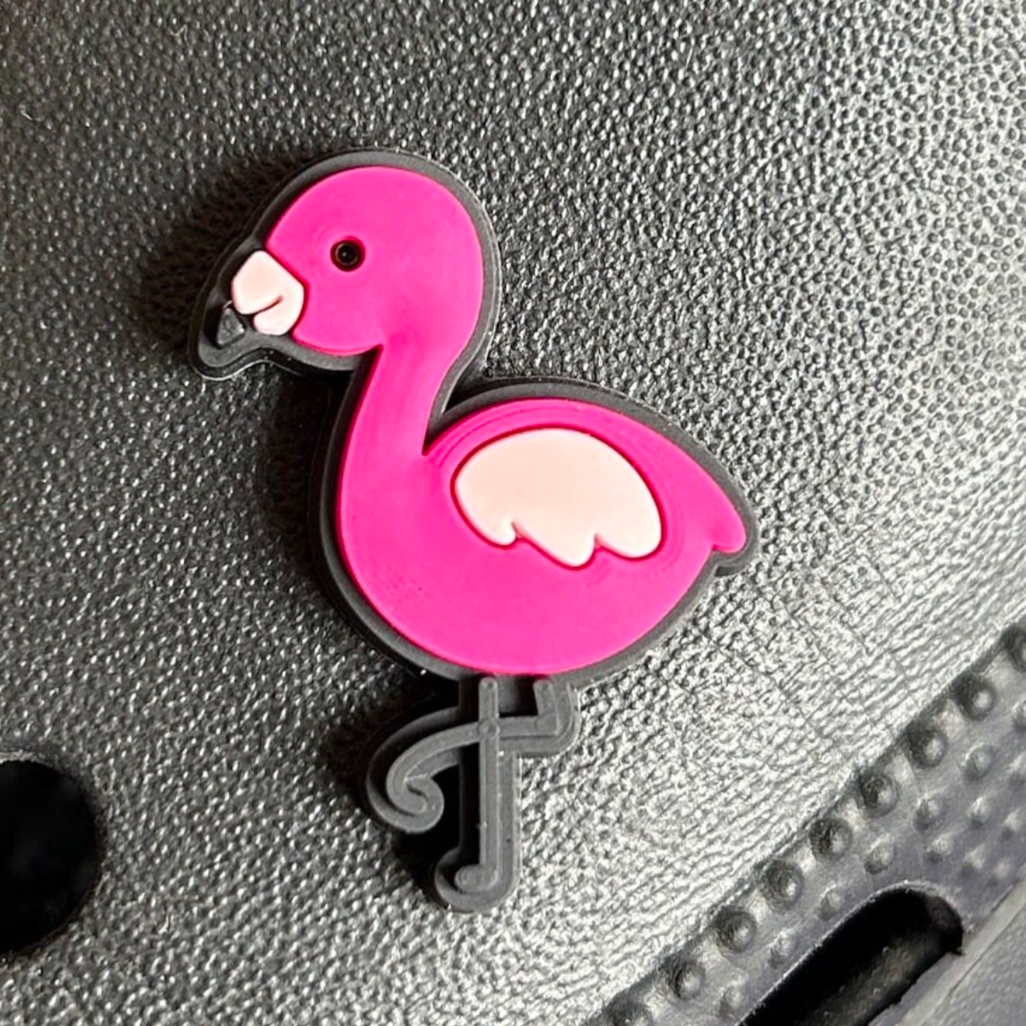 Pink Flamingo Bird croc like shoe charm. Shown on a black croc shoe. 