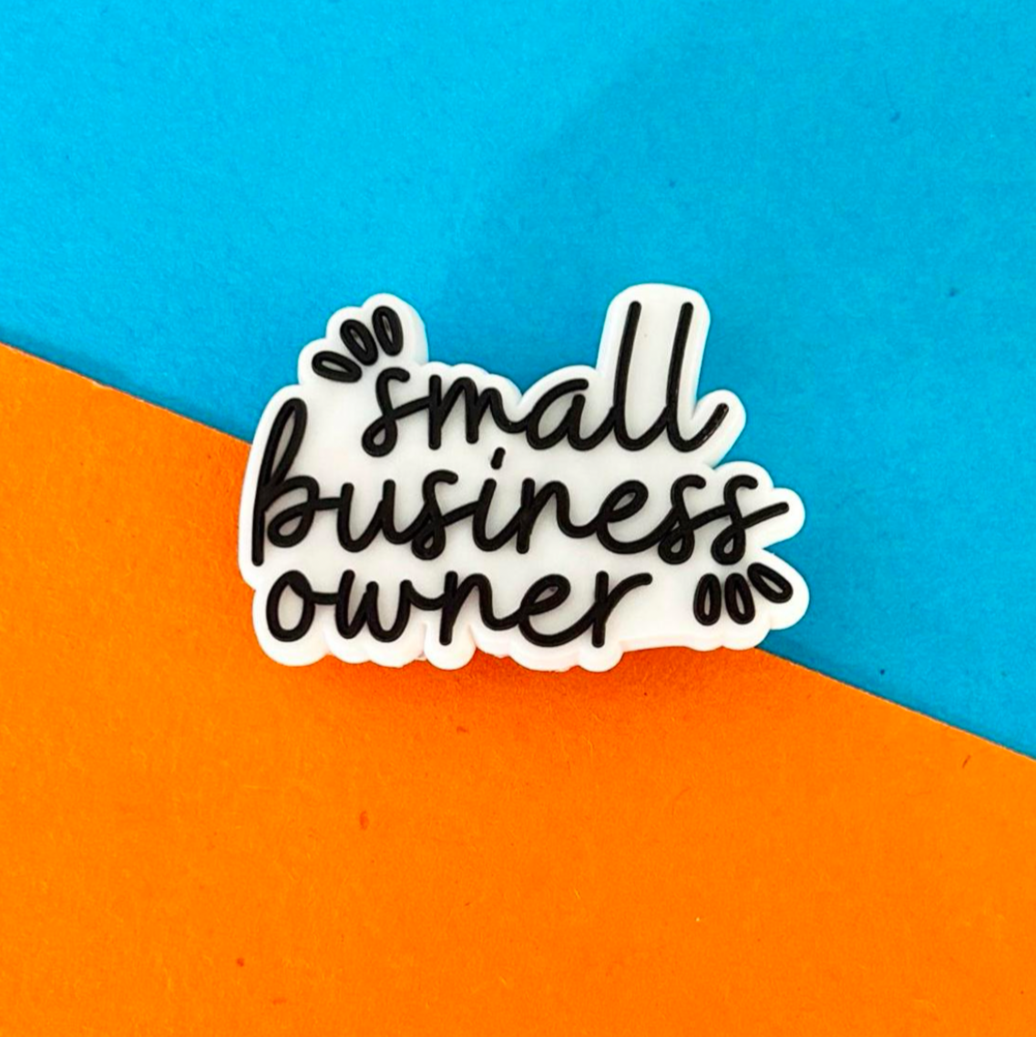 Small business owner slogan croc like shoe charm.