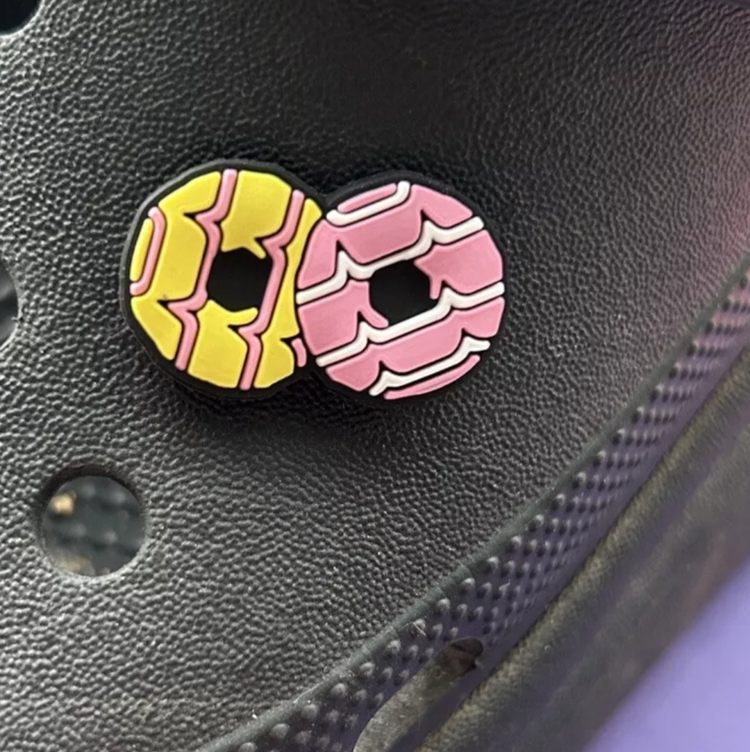 Sugar Ring Biscuits croc like shoe charm. Shown on a black croc shoe. 