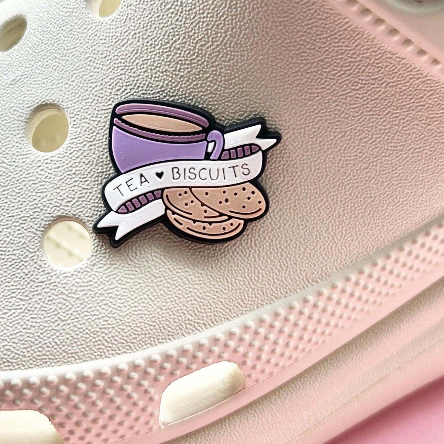 Tea and Biscuits croc like shoe charm. Shown on a cream croc shoe. 