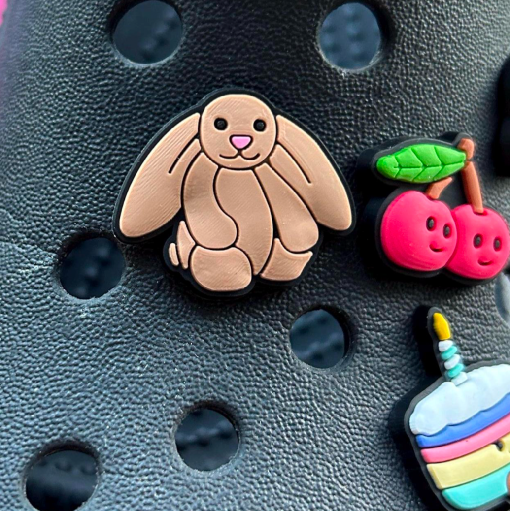 Long Ear Rabbit croc like shoe charm. Shown on a black croc shoe. 