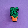Monstera plant Croc shoe charm. Green plant in an orange pot. 