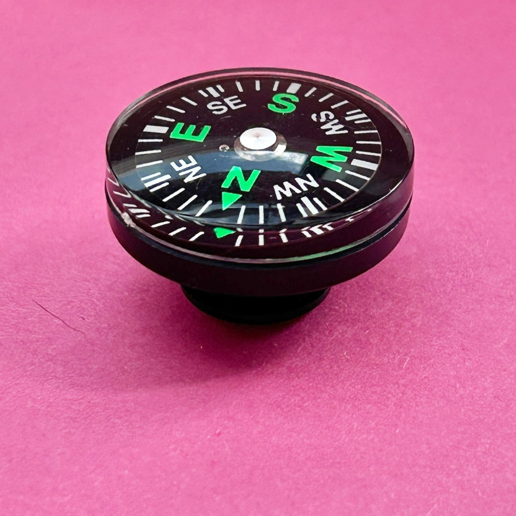 3D working compass croc shoe charm. Side view.