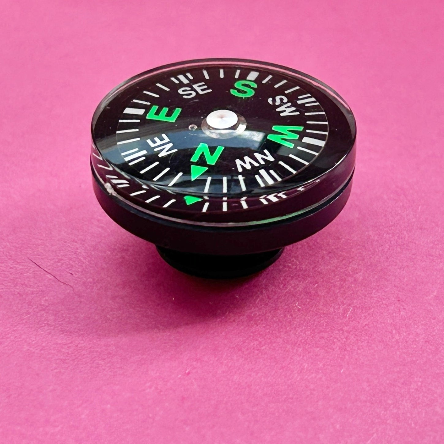 3D working compass croc shoe charm. Side view.
