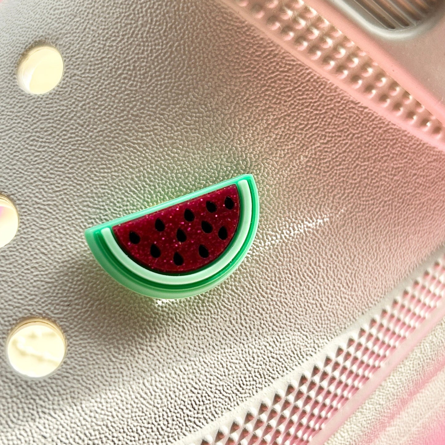 Glitter Watermelon croc shoe charm. Shown on a cream croc shoe. 