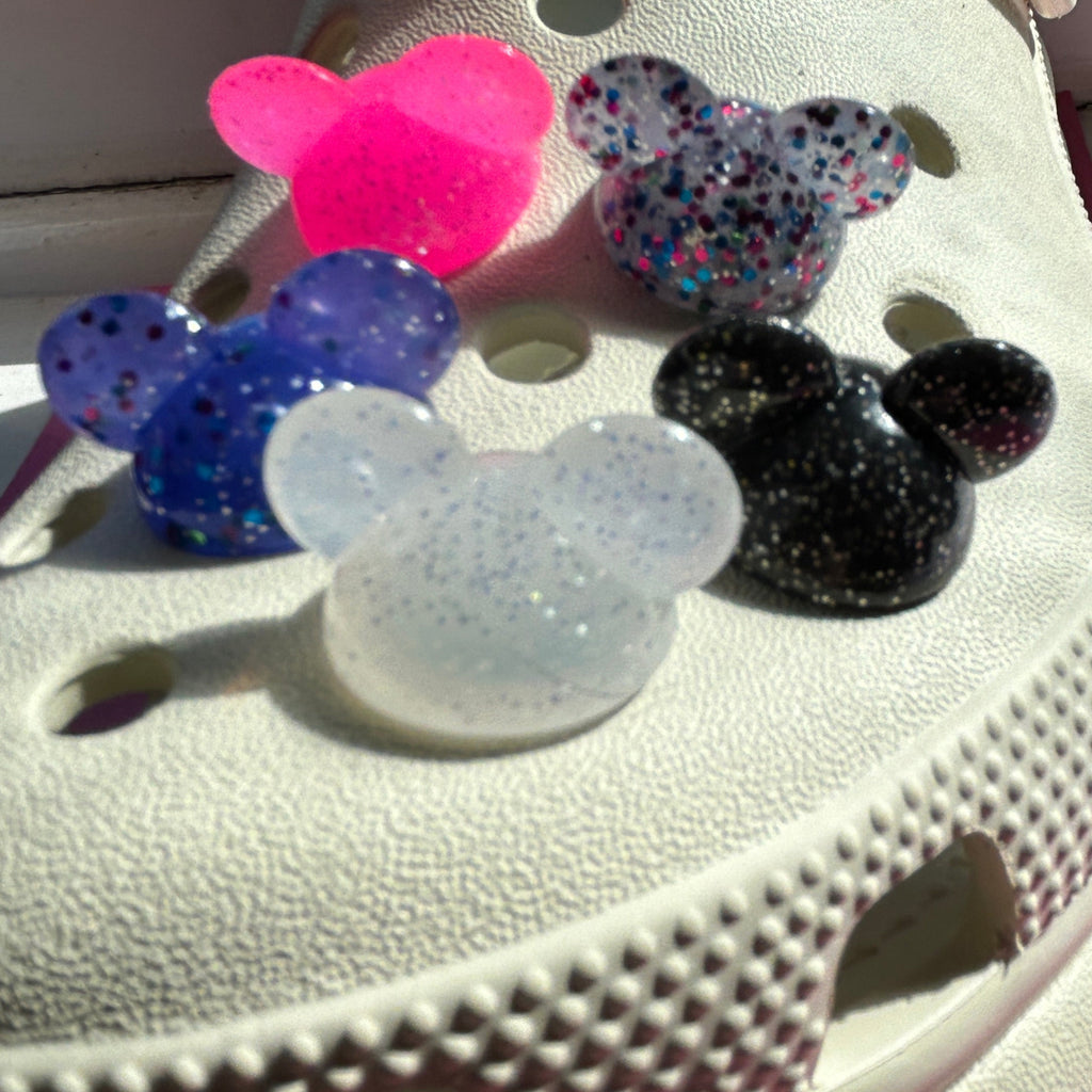 3D Glitter mouse ears modelled on a cream croc shoe. 