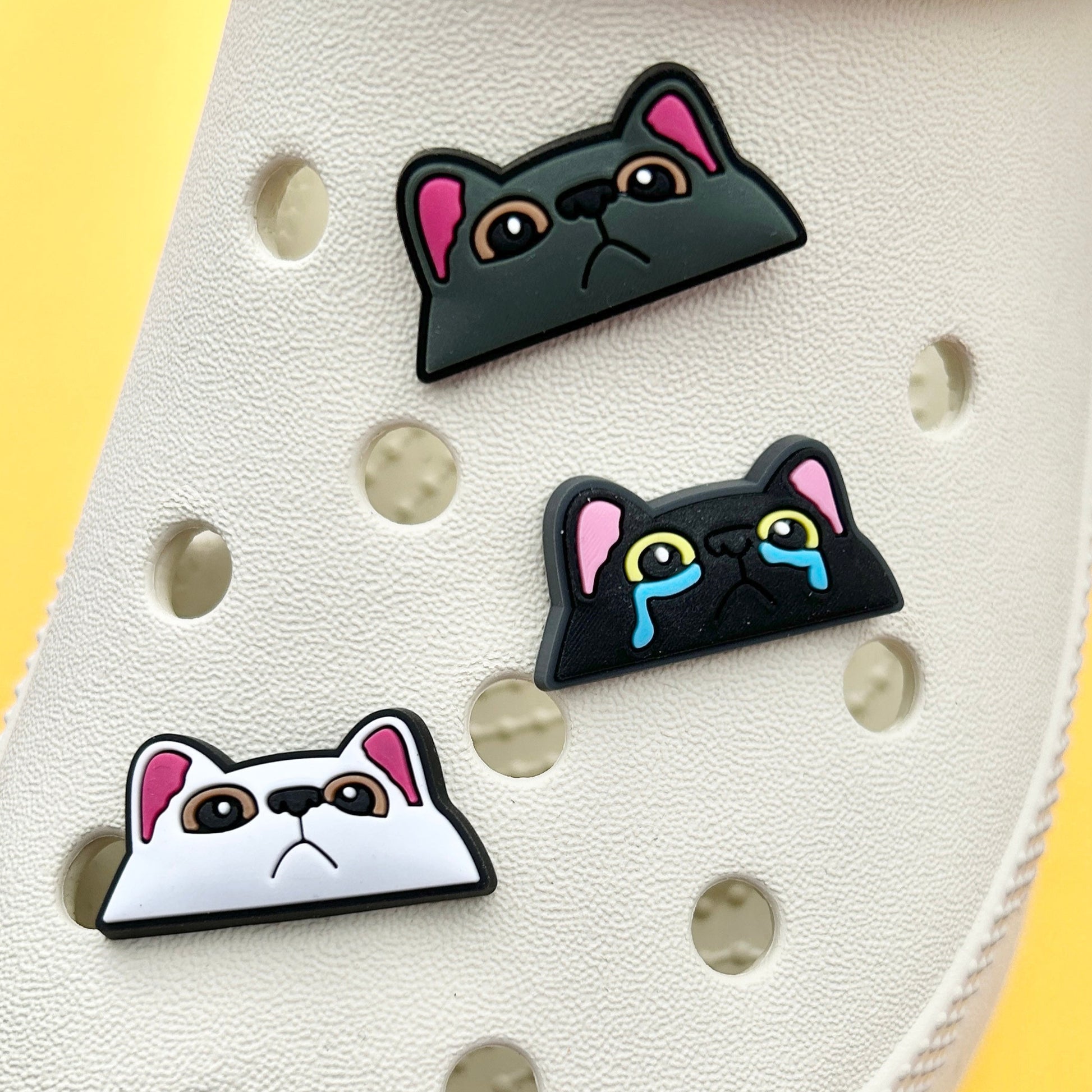 Cat Faces Croc charms. All three versions shown on a cream croc shoe. 