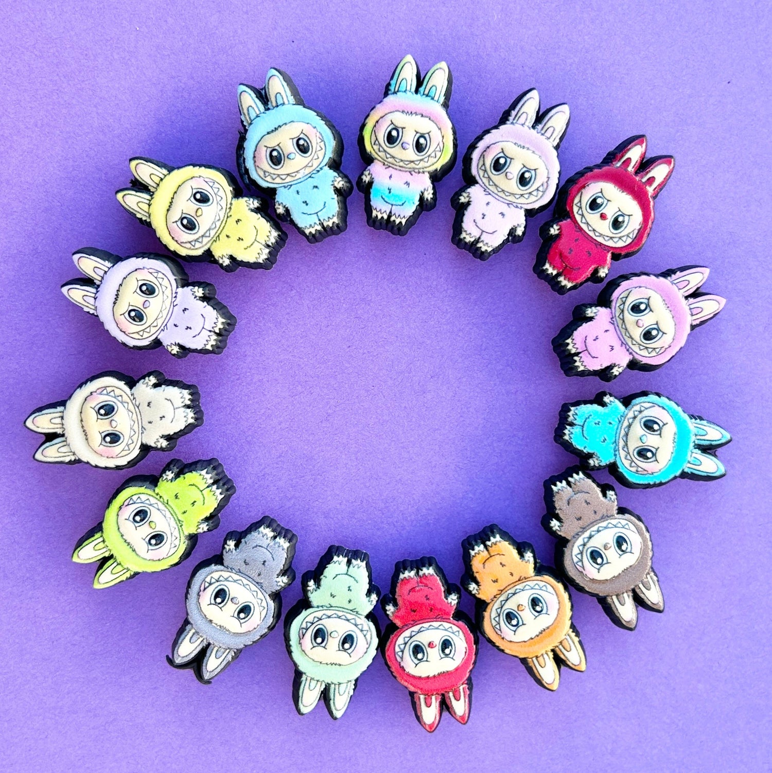 UV printed in the style of labubu croc shoe charms. 5 colours in a circle.