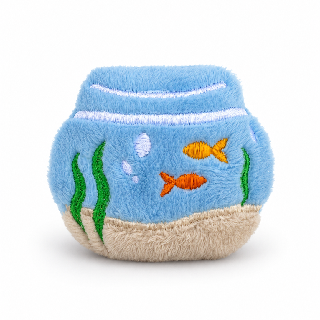 A plush fidget toy fishbowl in light blue, featuring embroidered orange fish, green seaweed, white bubbles, and a sandy beige bottom, set against a plain white background.
