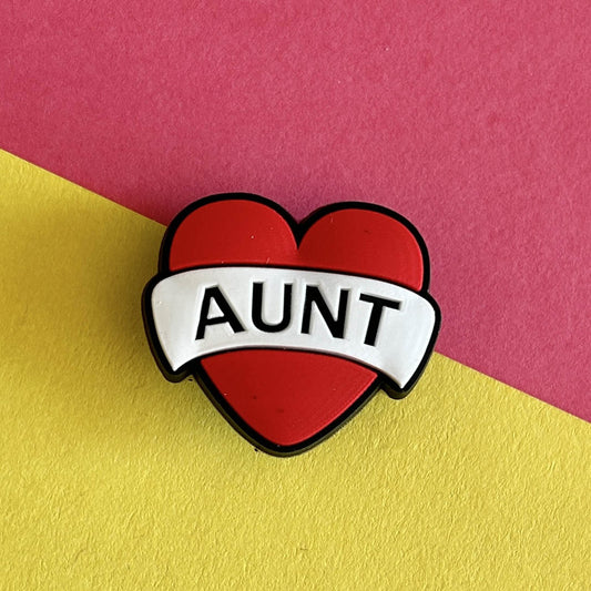 Red heart with the word Aunt croc like shoe charm.