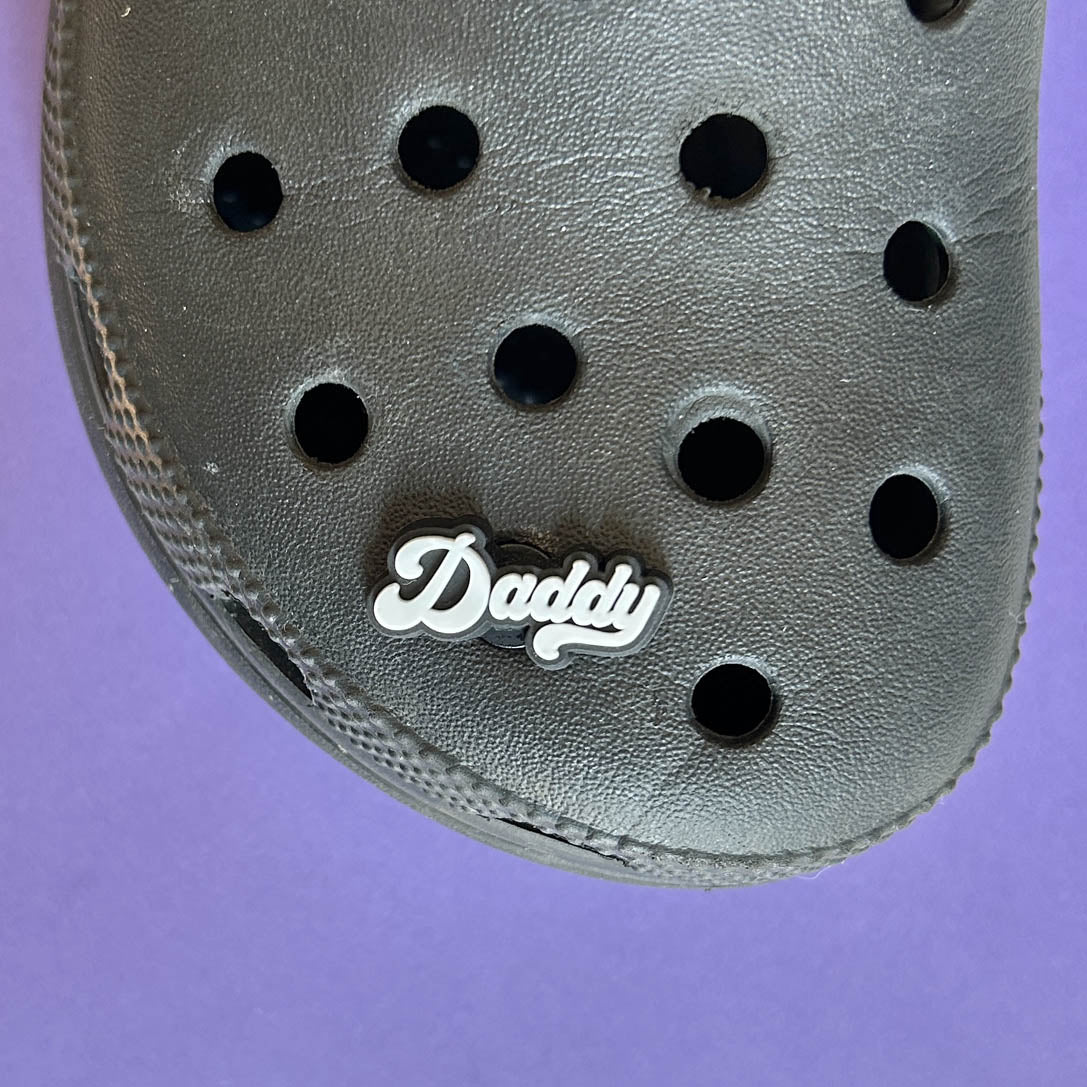 Daddy Shoe Charm on a croc shoe.