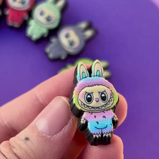 Video showing UV printed croc charm. 