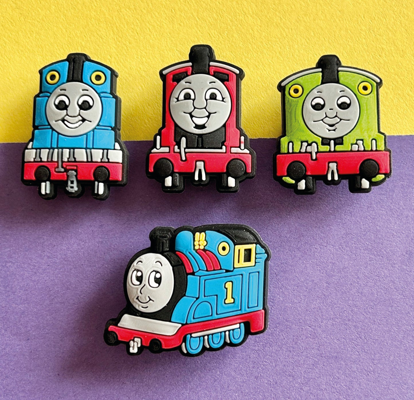 Set of 4 famous character train shoe charms.