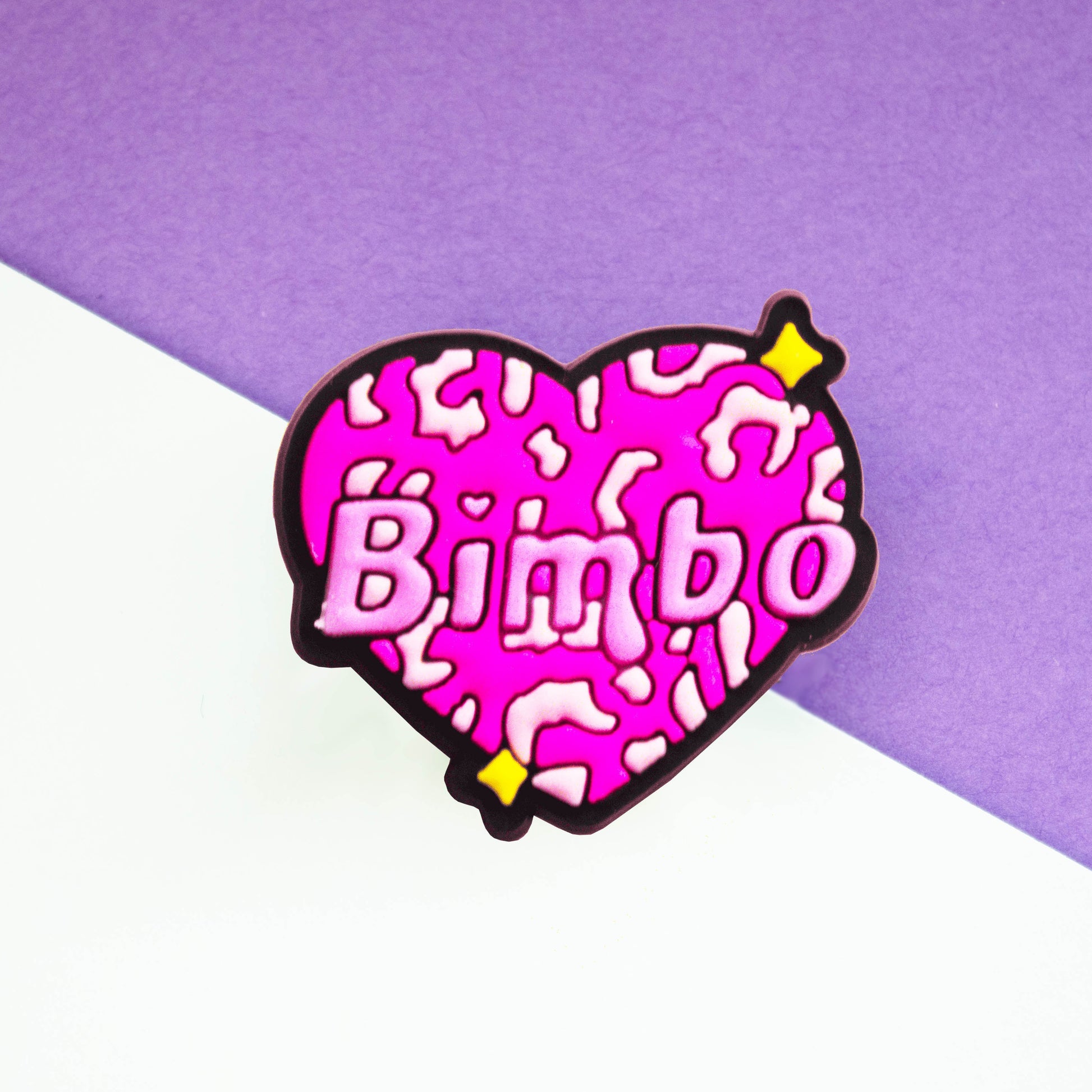 Bimbo word inside a pink leopard print heart. 